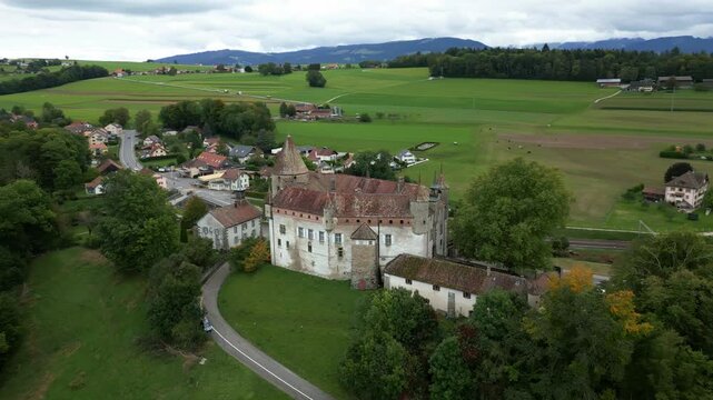 Orbit drone shot of magnificent Oron Castle in Vaud Switzerland