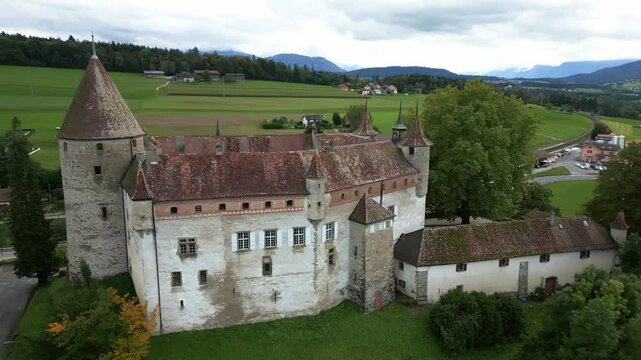 Parallax drone shot close to beautiful Oron Castle in Vaud Switzerland
