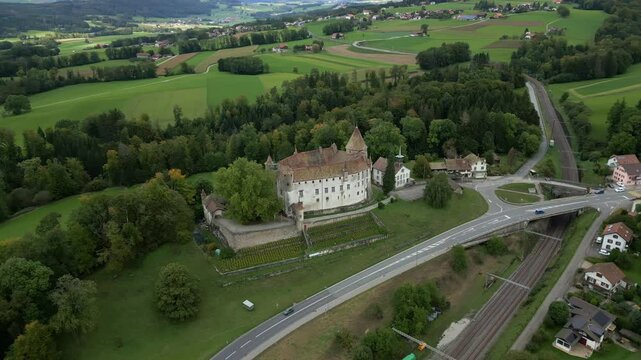 Parallax drone shot above wonderful Oron Castle in Vaud Switzerland