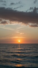 Sunset sky over tranquil ocean waves background for invitation or card screensaver