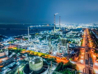 Naklejka premium Oil refinery and chemical plant at seaside