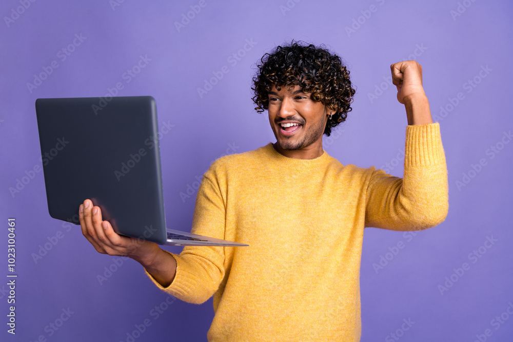 Poster Photo of cheerful positive glad man wear stylish yellow clothes win money isolated on purple color background