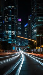 Naklejka premium Abstract Light Trails of City Traffic: Long-Exposure Shot Capturing Vibrant Motion at Night