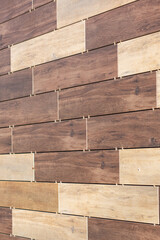 Closeup view of a wooden floor with embedded nails