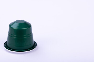 Isolated Green Coffee Capsule Against White