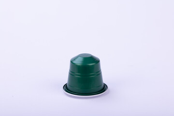 Green Coffee Capsule on White Background