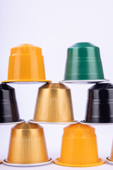 Artistic Display of Coffee Capsules in Pyramid Formation