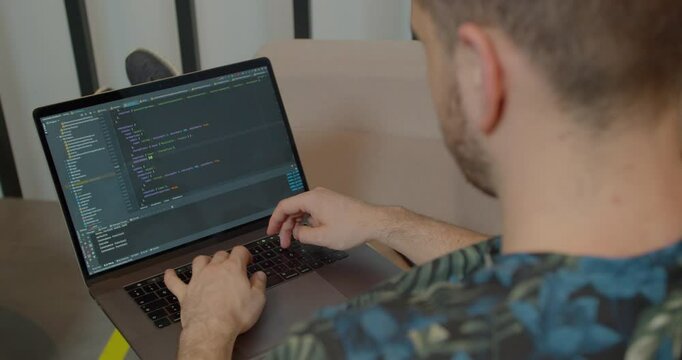 Close up Man coding html and programming on screen Monitors, development web, developer.