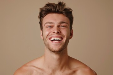 Obraz premium Happy man with white smile after teeth whitening procedure.