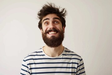 Obraz premium Happy cool man in striped shirt lucky and handsome.