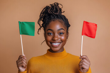 Young adult woman is holding green and red flags, smiling and promoting healthy choices and positive communication in relationships