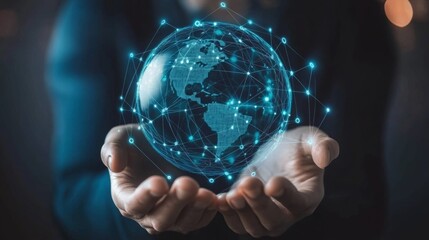 A person holding a glowing, digital globe with interconnected data points, symbolizing technology, connectivity, and global communication.