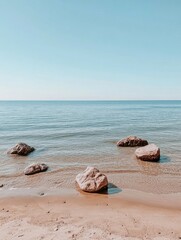 Obraz premium Serene Beach Scene with Rocks and Water