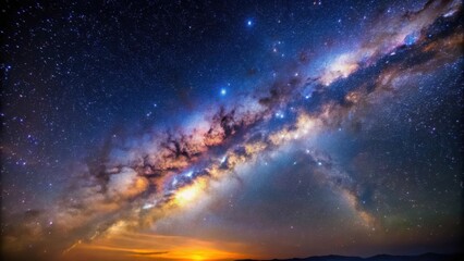 Fototapeta premium A breathtaking night sky with the majestic Milky Way galaxy spanning across a field of twinkling stars, showcasing the vastness and beauty of the cosmos.