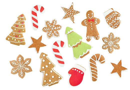 many different Christmas gingerbread cookies on a white isolated background, top view