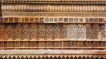 Carvings on the wall of Bai Harir Sultani Tomb, Ahmedabad, Gujarat, India.