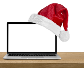 a modern laptop computer with a Santa Claus hat for Christmas on a whitr background