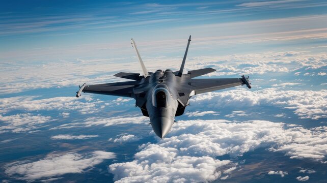 Fighter jet flying over clouds, blue sky background