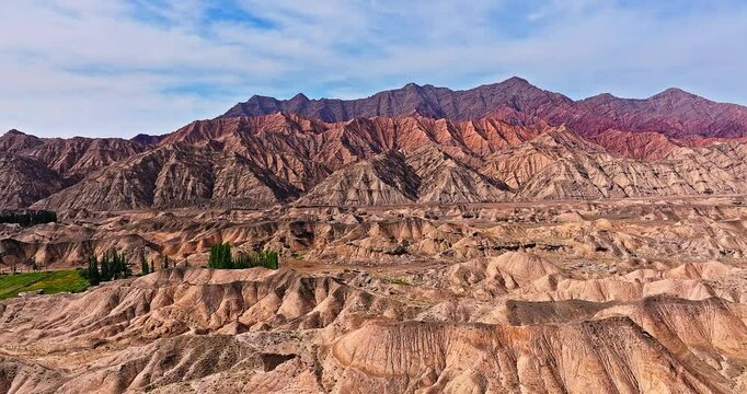 Spectacular Danxia landform mountain natural landscape in Xinjiang. Unique geographical scenery in China. Like a scene from another planet.