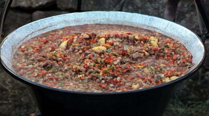 Vegetables and goulash in a goulash pot