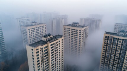 Fototapeta premium Aerial view of a major city blanketed in smog, buildings fading into the polluted air, dull colors reflecting poor air quality, environmental crisis concept 