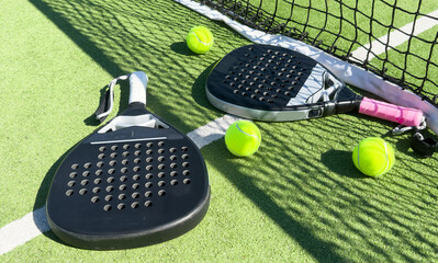 padel tennis racket sport court and balls.