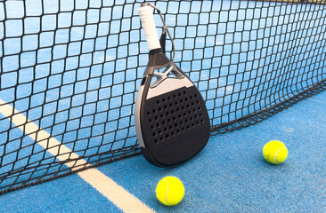 Paddle objects on blue turf