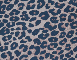 Satin fabric covered with leopard print