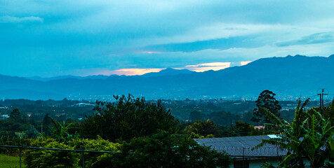 Mountain landscape city panorama and forest sunset sunset Costa Rica.