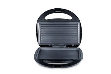 Black and steel sandwich maker on a white isolated background