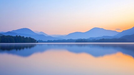 Fototapeta premium Peaceful lake reflecting the surrounding mountains during a beautiful sunrise. Ideal for outdoor adventure, travel, and nature themes. 