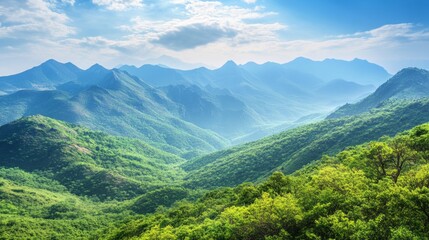 Fototapeta premium Scenic mountain range with clear skies and lush green valley. Ideal for outdoor adventures, nature tourism, and environmental conservation.