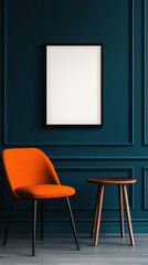 Orange chair and small table in a teal room with a framed print.