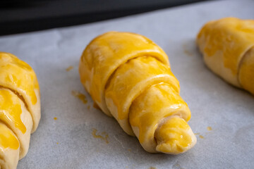 raw croissant with butter