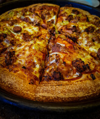 pizza with ham and cheese.
Top view of the pizza .
Pizza with ketchup