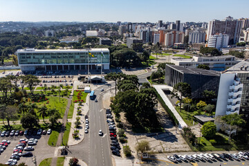 Image using drone, on a slightly sunny day, of Palacio Iguacu, headquarters of the Executive Branch of the state of Parana, and to the right the Legislative Assembly.