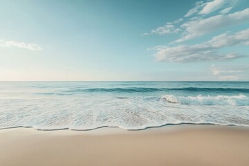 Obraz premium Serene Beach Scene with Gentle Waves