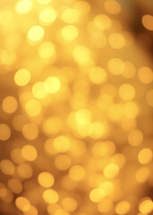 Obraz premium Golden Christmas background with abstract bokeh effect. Blurred glittering lights and sparkles create a luxurious atmosphere. Magical festive background with space for text, perfect for greeting cards