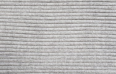 Soft warm grey knitted flat background