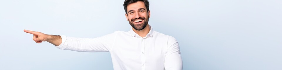 Obraz premium A man is pointing to the right with a smile on his face. Concept of positivity and encouragement