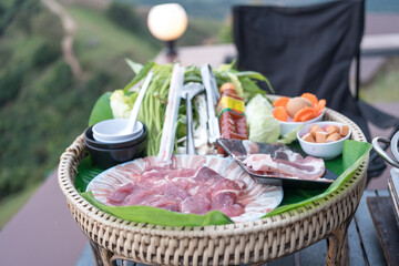Set of Thai barbecue in the evening at mountain view background, Traditional Thai BBQ style is famous in Thailand
