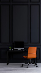 Minimalist home office with black walls and an orange chair.