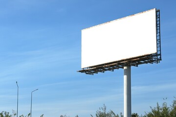 Fototapeta premium Empty Billboard Against a Clear Blue Sky