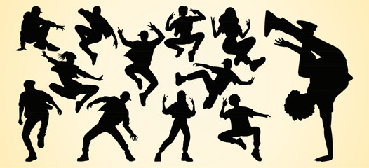 Silhouettes of dancers in dynamic poses, showcasing energetic movements and breakdancing, representing street dance and hip-hop culture.