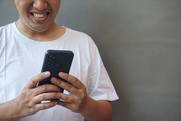 Man Reacting to Smartphone Content Surprise, Shock, or Amazement