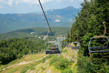 cable car in the Appenino-Tosco Emiliano mountains across the panoramic view. Emilia-Romagna, Italy