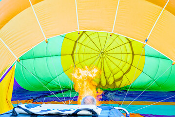 Preparing a hot air balloon to start the flight, heated by hot air