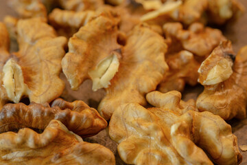 Peeled Walnuts Pile Close up. Texture , macro photo.