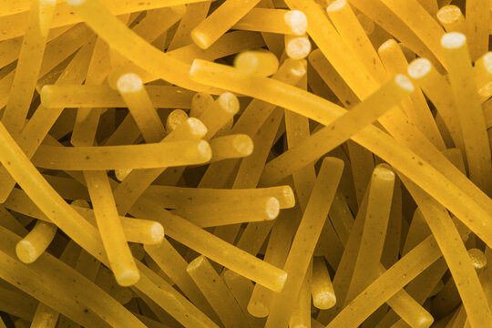 yellow thin vermicelli close up , Italian , texture.
