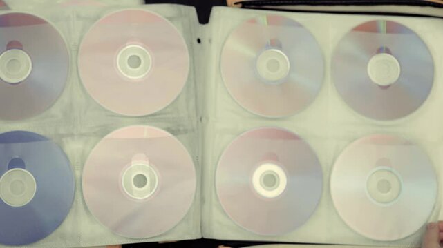 Close up of cd discs in a holder. Disc with data,movie or music.